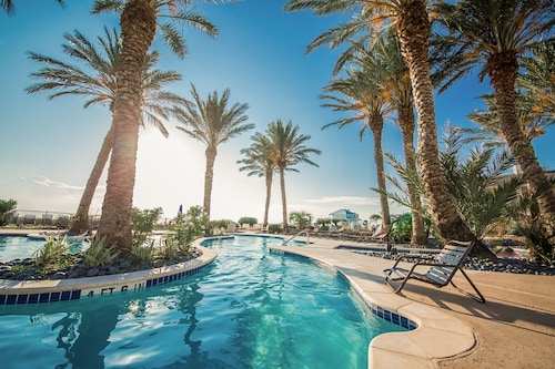 Pointe West getaway with pool, hot tub & bay-view balcony - walk to beach