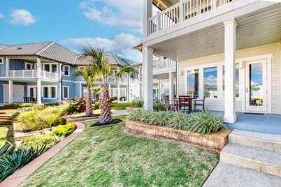 Bright waterfront villa with pool, boat slip, patio & balcony in gated community