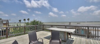All-suite bay-view home with yard, kayak, & rooftop deck with panoramic views