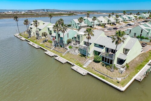 Canal-Front Condo in Puente Vista | Boat Dock, Pool, 3 Kayaks & 3 SUP Boards