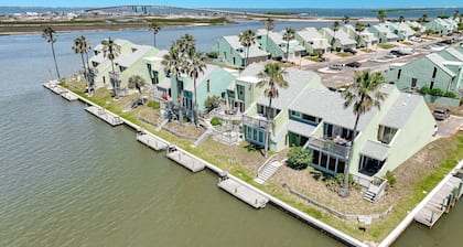 Canal-Front Condo in Puente Vista | Boat Dock, Pool, 3 Kayaks & 3 SUP Boards