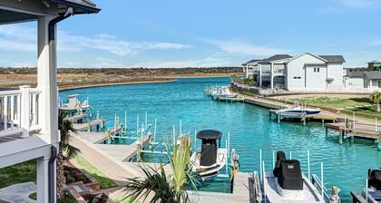 Sophisticated canal-view villa with pool, vast fishing pier, deck & washer/dryer