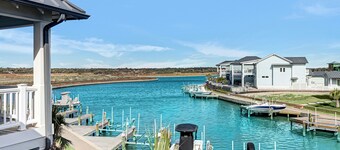 Sophisticated canal-view villa with pool, vast fishing pier, deck & washer/dryer