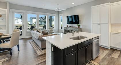 Sophisticated canal-view villa with pool, vast fishing pier, deck & washer/dryer