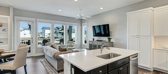 Sophisticated canal-view villa with pool, vast fishing pier, deck & washer/dryer