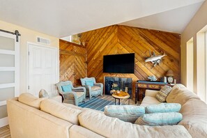 TV, fireplace - Dog-Friendly Beach House with Direct Ocean Views & Free WiFi (Port Aransas)