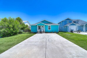 Stunning home in a quiet neighborhood with a front porch and garage.