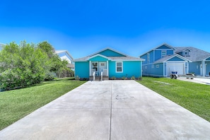 Stunning home in a quiet neighborhood with a front porch and garage.