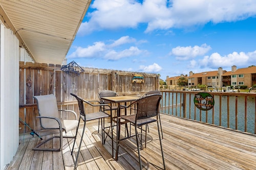 Canal-front home with backyard boat slip & balcony - near the beach