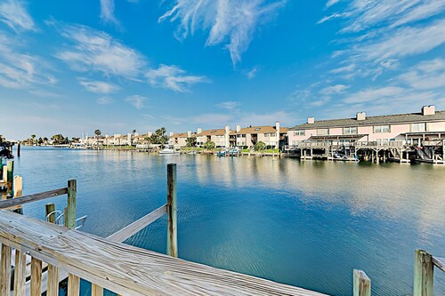 Canal-front home with backyard boat slip & balcony - near the beach