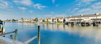 Canal-front home with backyard boat slip & balcony - near the beach