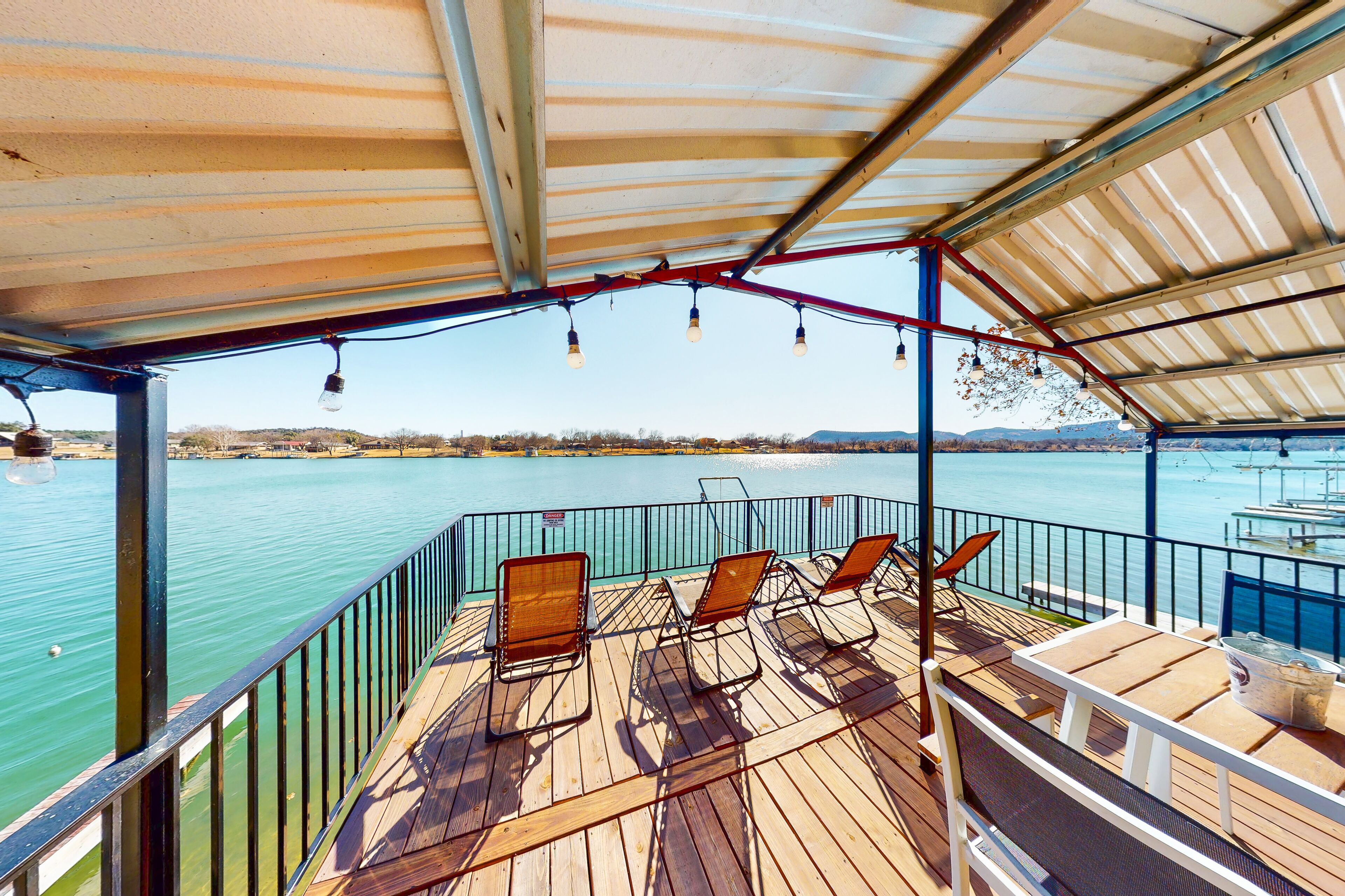 Modern lakefront beauty with grill house, private dock, slip & boat launch