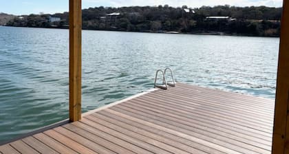 Mid-century modern lake house w/private waterfront pool & boat dock