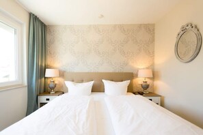 2 chambres, coffres-forts dans les chambres, Wi-Fi, draps fournis