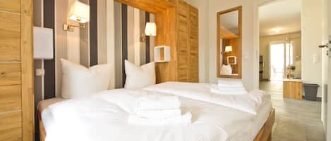 2 chambres, coffres-forts dans les chambres, Wi-Fi, draps fournis