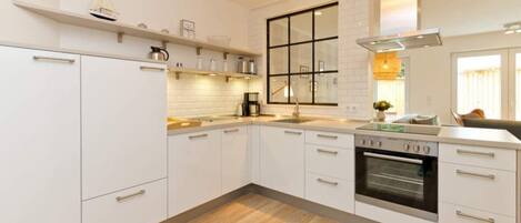 Fridge, oven, dishwasher, coffee/tea maker