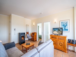 Fernseher, Kamin