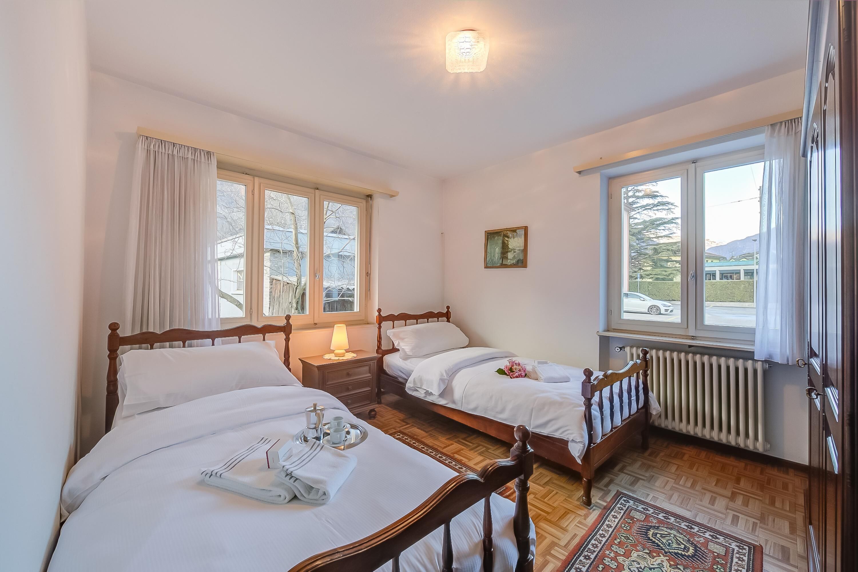 Apartamento família, 2 quartos (Casa Salogni) | 2 quartos, ferros/tábuas de passar roupa, roupa de cama