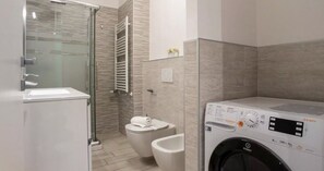 Regadera, regadera tipo lluvia, secadora de cabello, bidet 