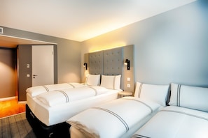 Standard Quadruple Room | In-room safe, blackout drapes, soundproofing, iron/ironing board