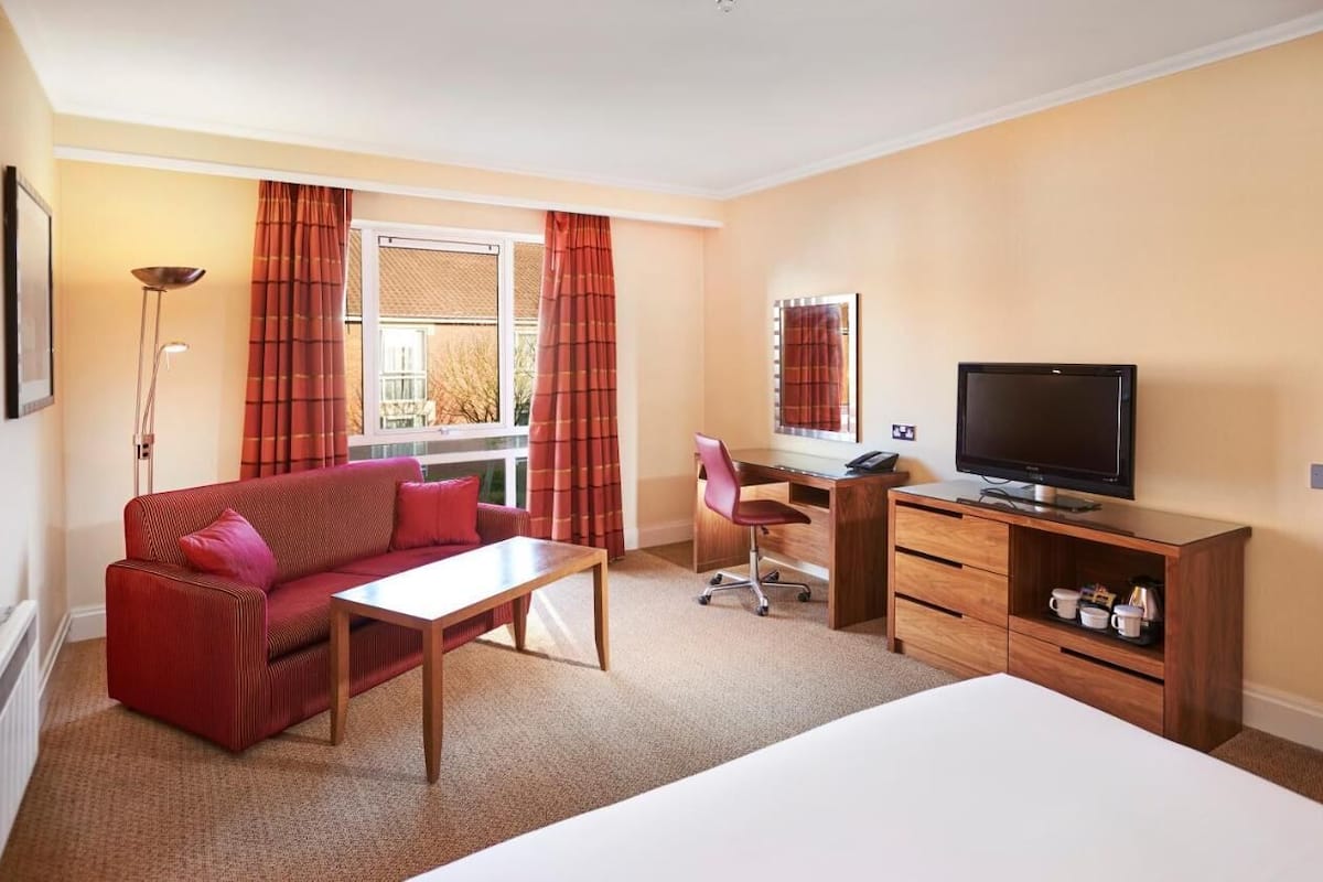 premium room | in-room safe, laptop workspace, blackout curtains, iron/ironing board
