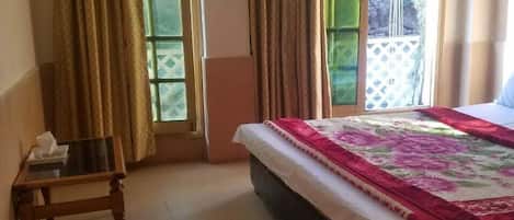 Chambre Deluxe Double ou avec lits jumeaux | Fer et planche à repasser, Wi-Fi gratuit