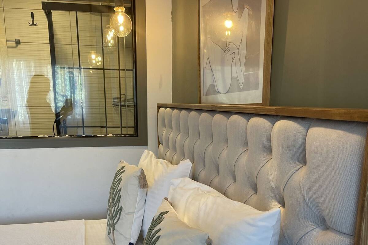 Edredón, camas Select Comfort y cortinas blackout