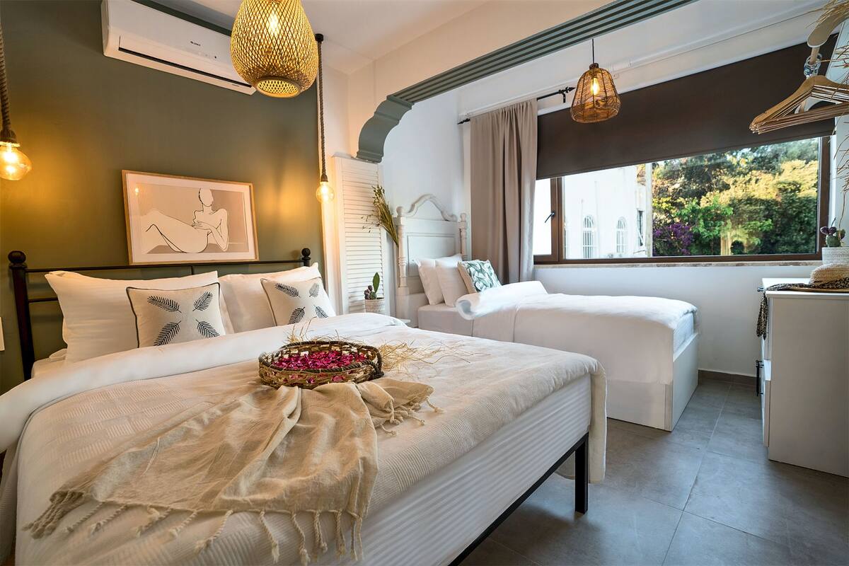 triple room, multiple beds, non smoking, courtyard view | 1 bedroom, down duvets, select comfort beds, blackout curtains