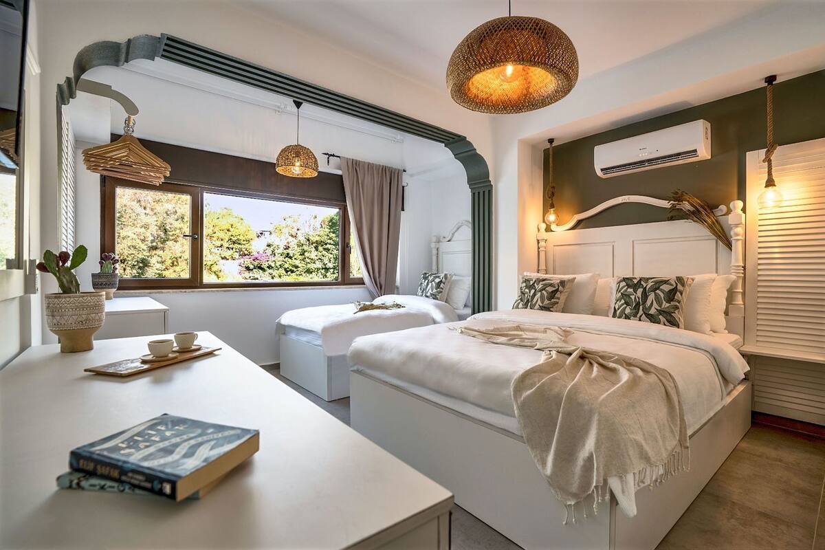 Edredón, camas Select Comfort y cortinas blackout