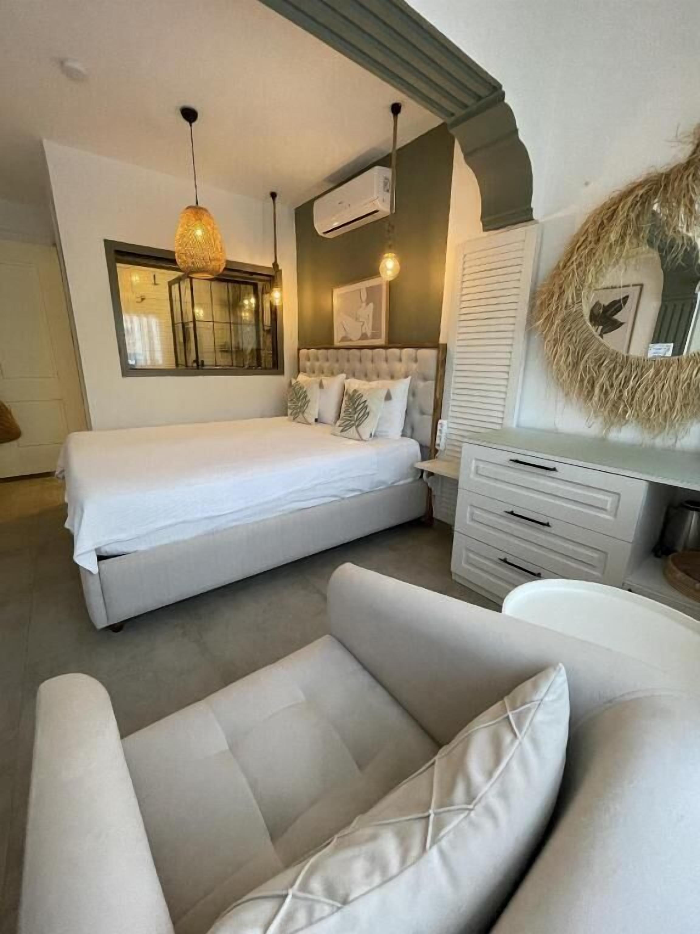 Down duvets, Select Comfort beds, blackout curtains, iron/ironing board