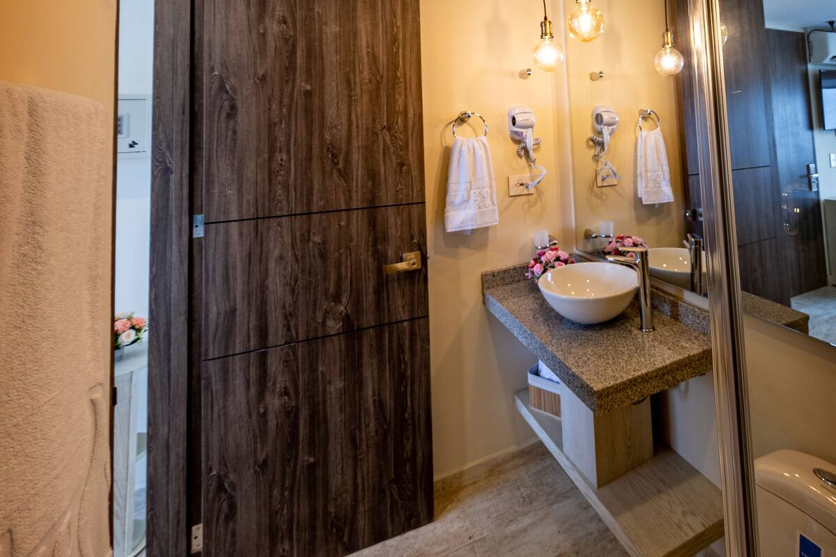 shower, rainfall showerhead, towels, soap