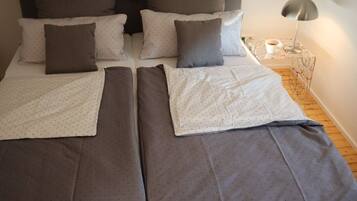 1 bedroom, desk, iron/ironing board, travel cot