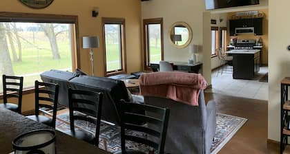 Lovely riverfront destination featuring open concept loft style. Water view.