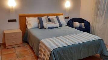 1 dormitorio, sistema de insonorización, tabla de planchar con plancha