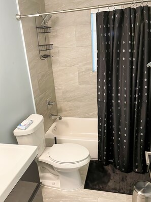 Combined shower/tub