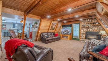 Téléviseur connecté, foyer, lecteur de DVD, livres