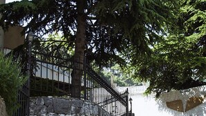 A set of stone steps with colorful painted edges leading up to a metal fence. - 19th Century Charming Ottoman Historical House   (Mount Lebanon Governorate)