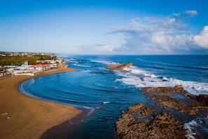 On the beach, sun-loungers, beach towels