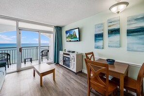 Enjoy ocean views from the balcony through the large sliding glass door.