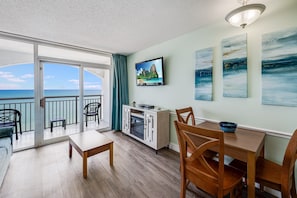Enjoy ocean views from the balcony through the large sliding glass door.
