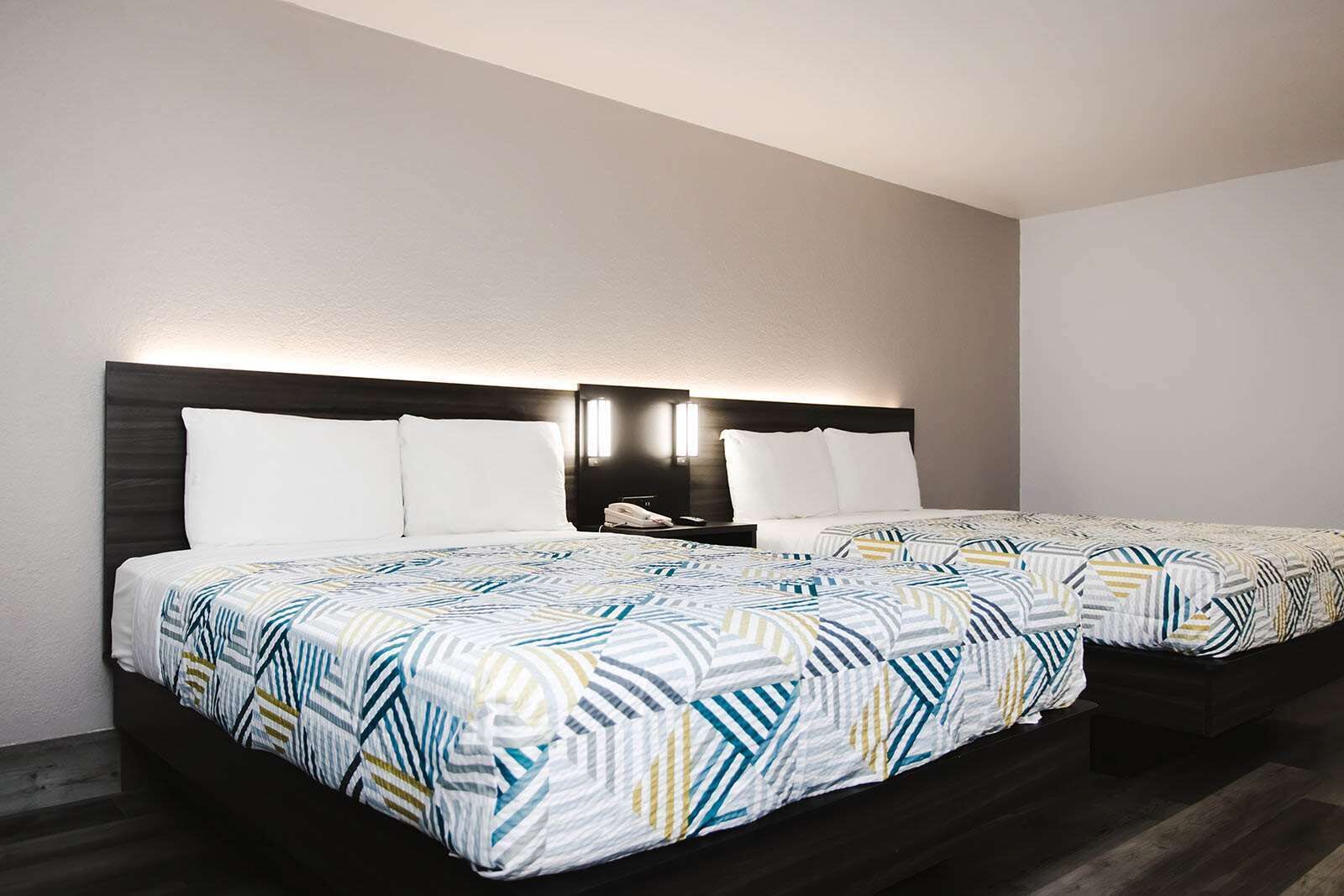 Desk, laptop workspace, blackout drapes, iron/ironing board