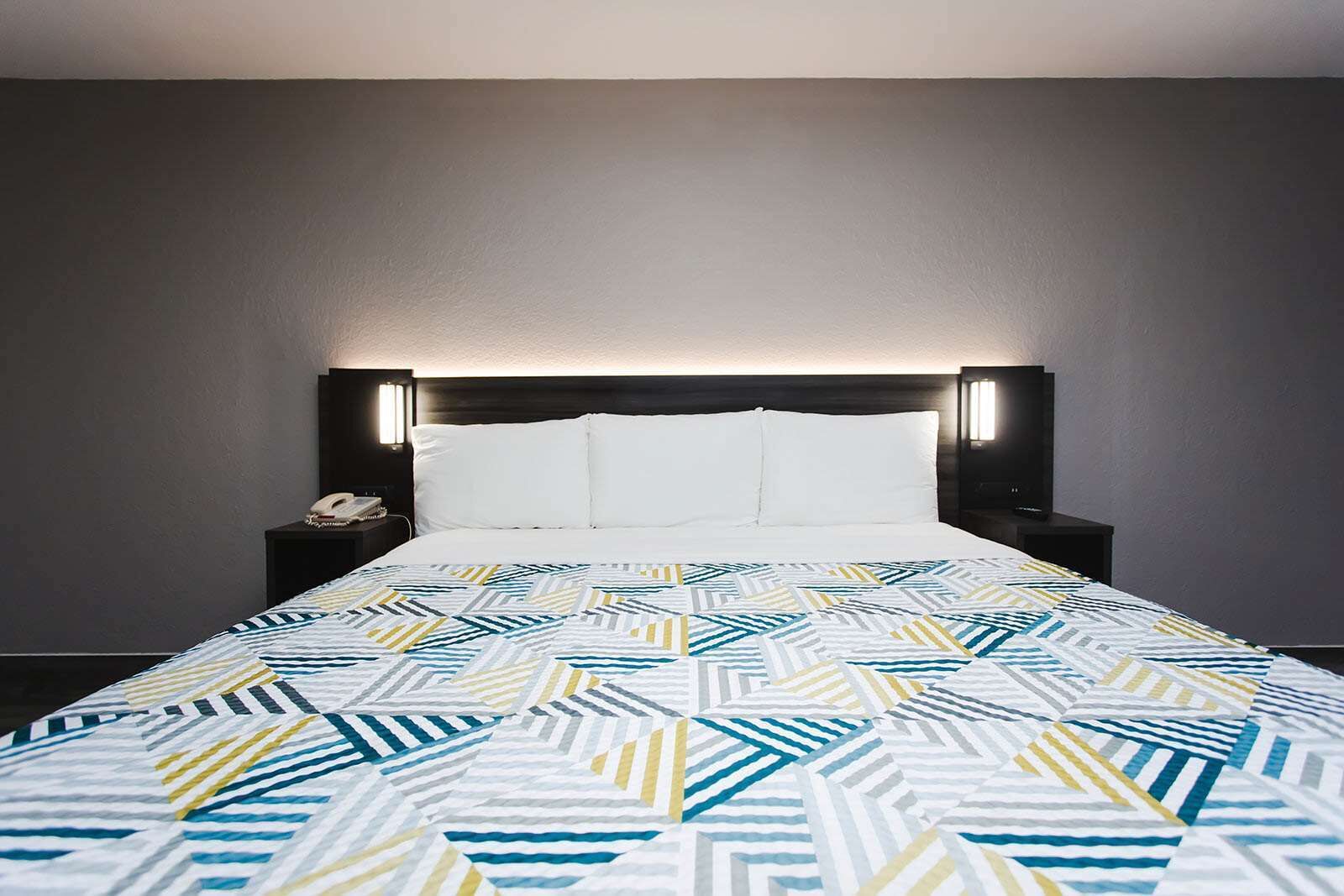 Desk, laptop workspace, blackout drapes, iron/ironing board