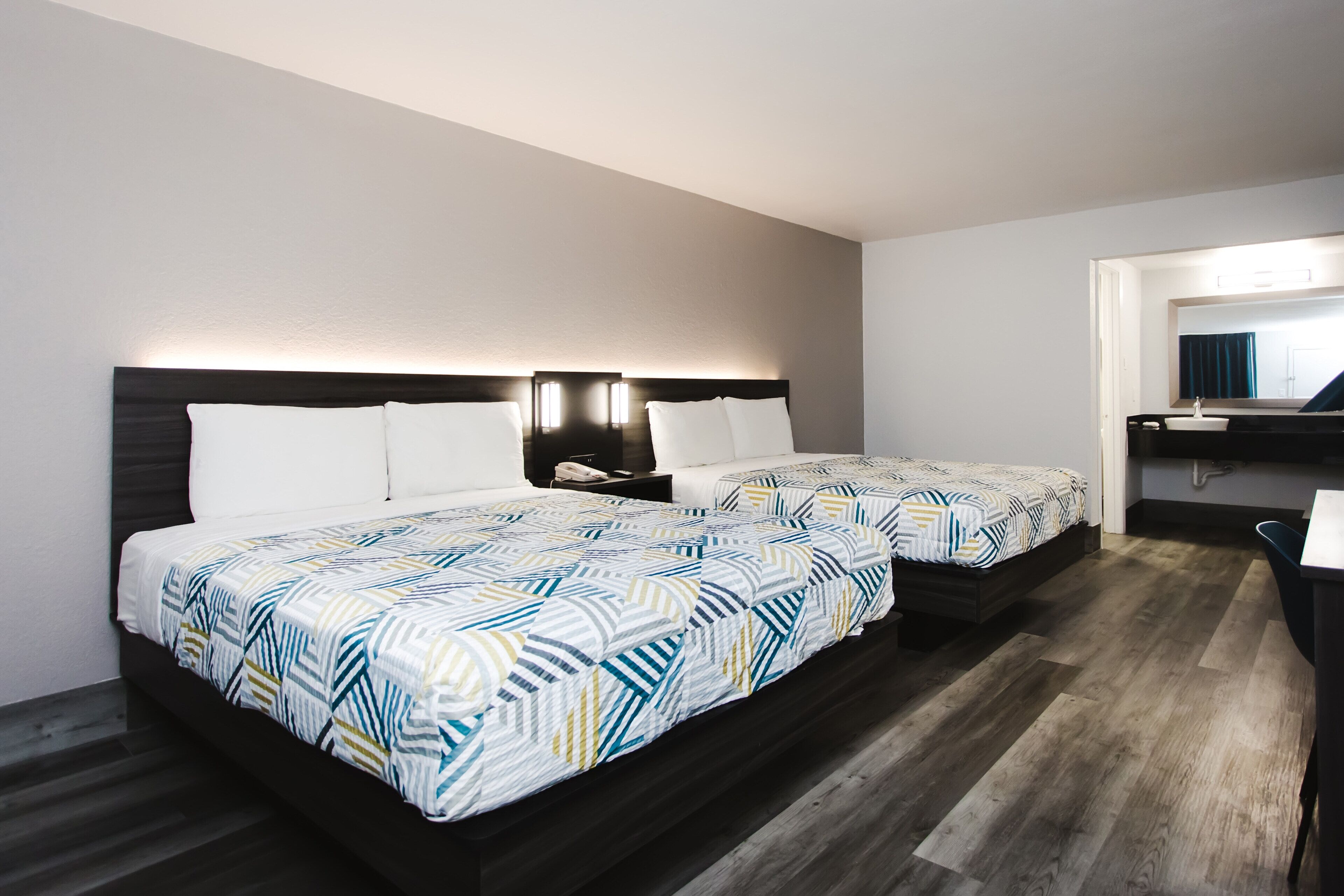 Desk, laptop workspace, blackout curtains, iron/ironing board