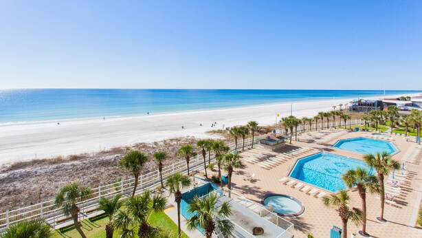 A resort with a pool area, beach access, and a view of the ocean. - Beautiful Gulf Front Condo!  Summit 627 (Panama City)