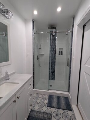 Shower, towels, soap, shampoo
