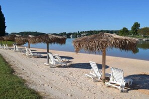 On the beach, sun loungers