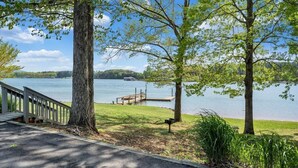 A lakeside view with a dock, a wooden staircase, and a grassy area. - Amazing View, Quiet Cove of Bernards Landing, Sandy Beach, 3 Kings and Twin Bunk (Moneta)