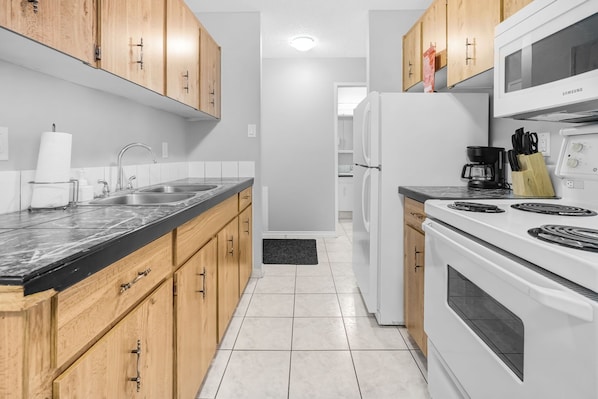 Fridge, microwave, oven, stovetop