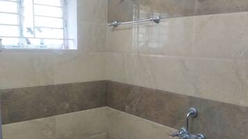 Shower, towels, soap, toilet paper
