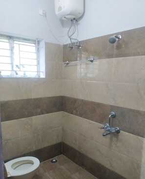 Shower, towels, soap, toilet paper